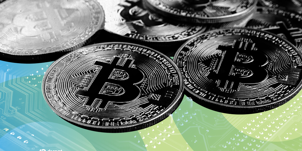 High-contrast black and white photo displaying multiple physical Bitcoin tokens layered across a technical document sheet.