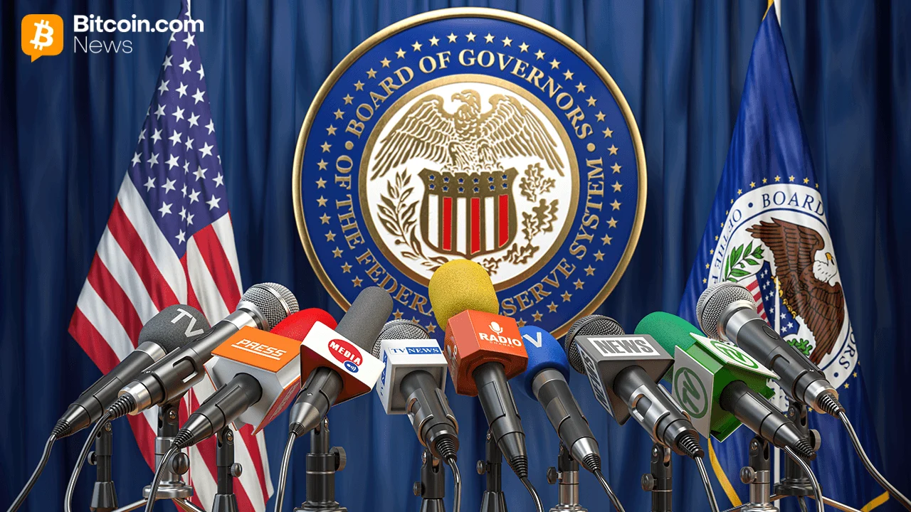 Close-up of the official circular gold wall seal of the Board of Governors of the Federal Reserve System.