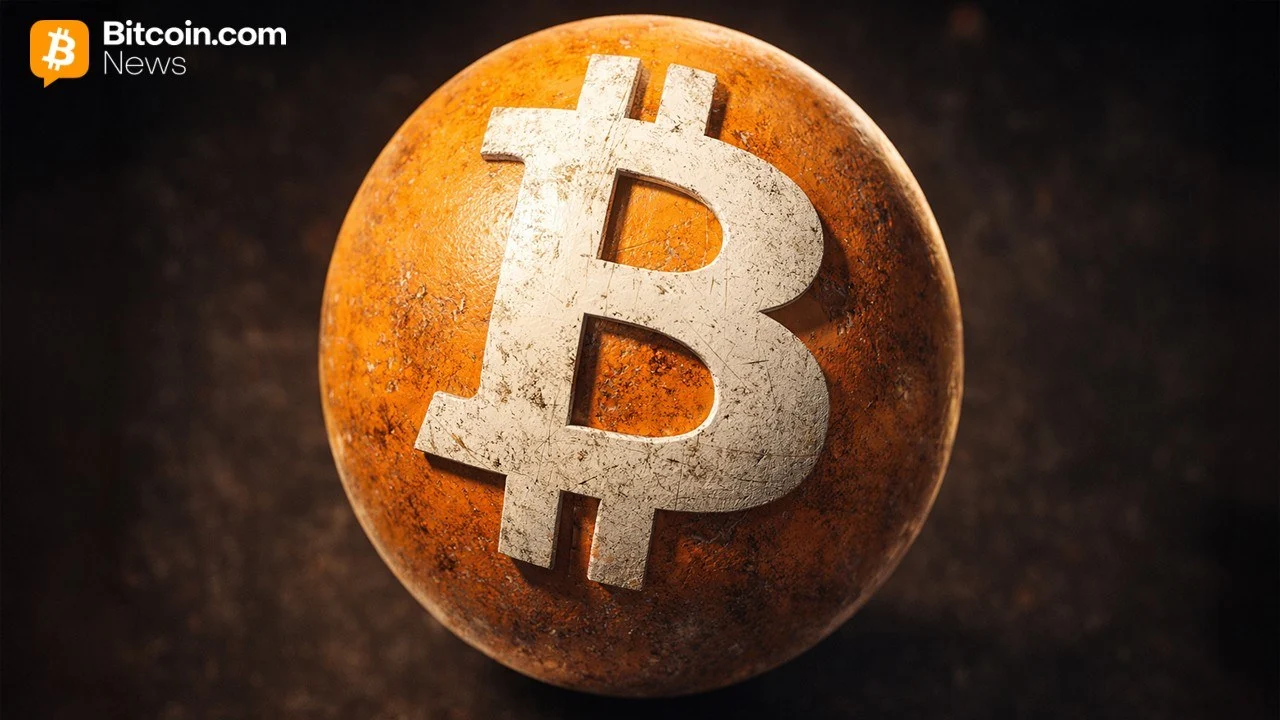 Close-up of a heavily textured, rustic copper Bitcoin token standing upright against a dark abstract textured surface.