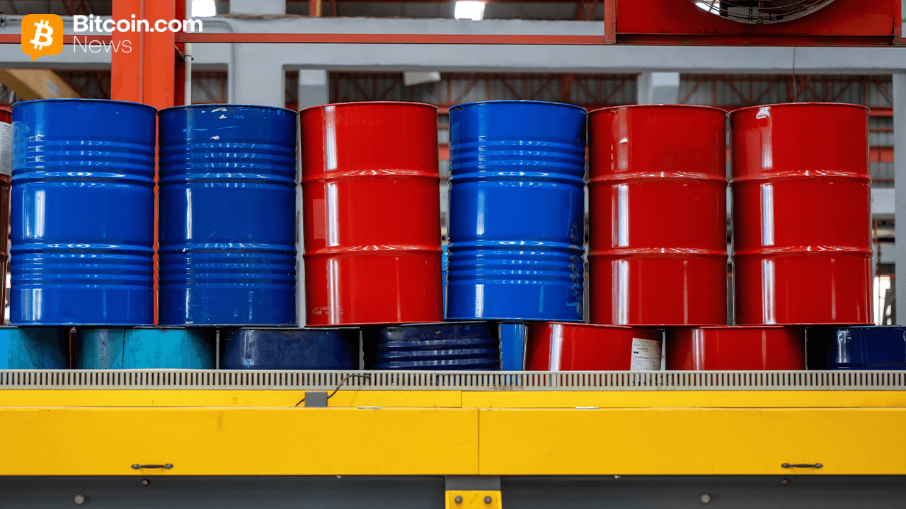 A neat horizontal row of three physical red industrial crude oil storage drums side-by-side.