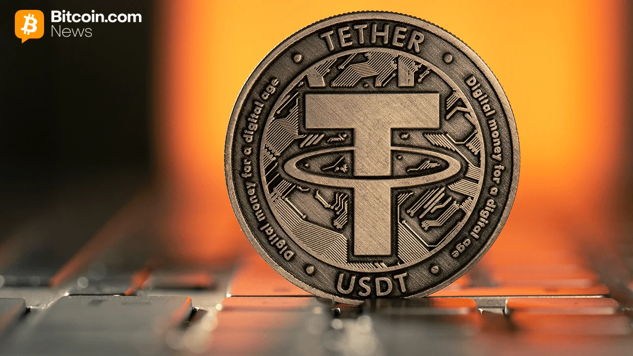 Close-up view of a heavy metallic copper coin stamped with the official Tether symbol text and circular rims.