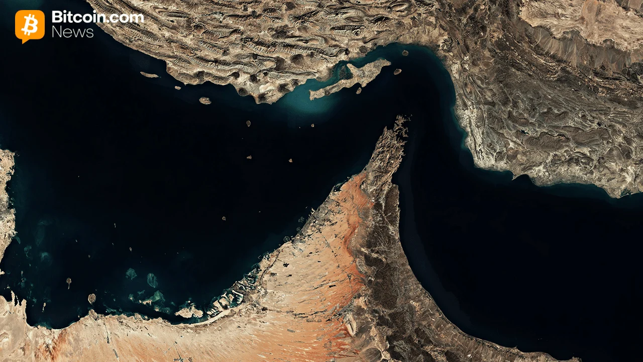 Satellite view looking down at the narrow coastal waterways of the strategic Strait of Hormuz corridor.