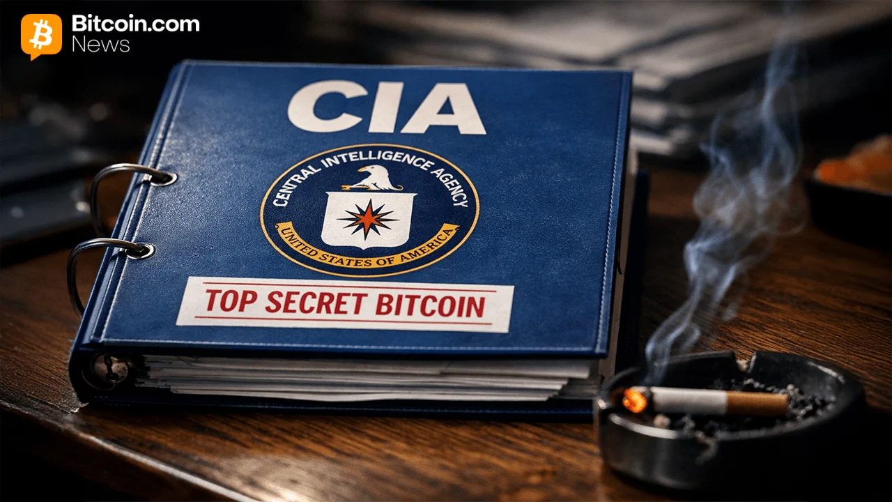 A dark blue book folder labeled CIA Official Intelligence Agency Top Secret Bitcoin sitting on a surface.