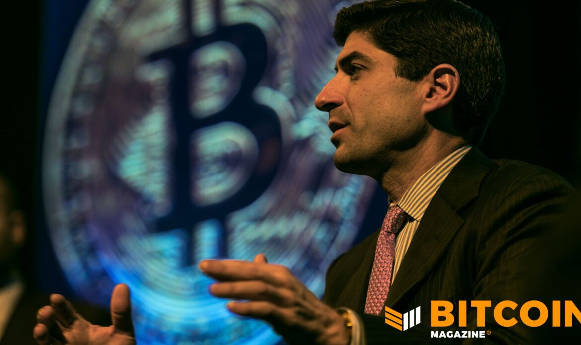 Side-profile portrait photo of financial executive Kevin Warsh talking during a media interview panel.