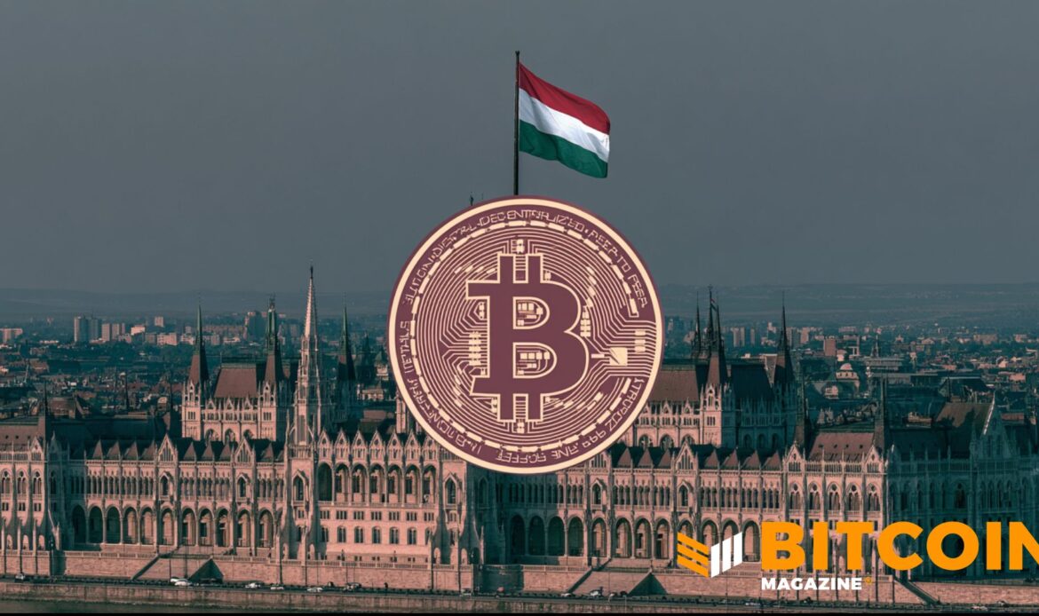 Bitcoin coin in front of Hungarian flag